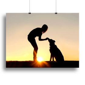 A silhouette of a girl sitting outside in the grass with her pet German Shepherd Mix Dog feeding him treats during training in front of a sunsetting s (type: Poster Print, size: 40" x 26" / 100cm x 65cm (approx))